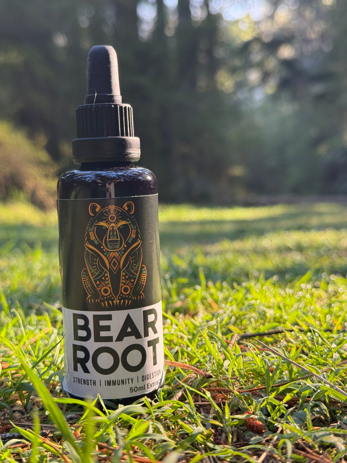Bear Root bottle in long grass